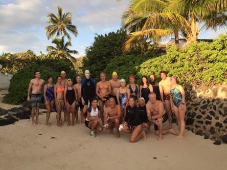 I'm the one on the far right in the pink swim cap and a blue striped suit.